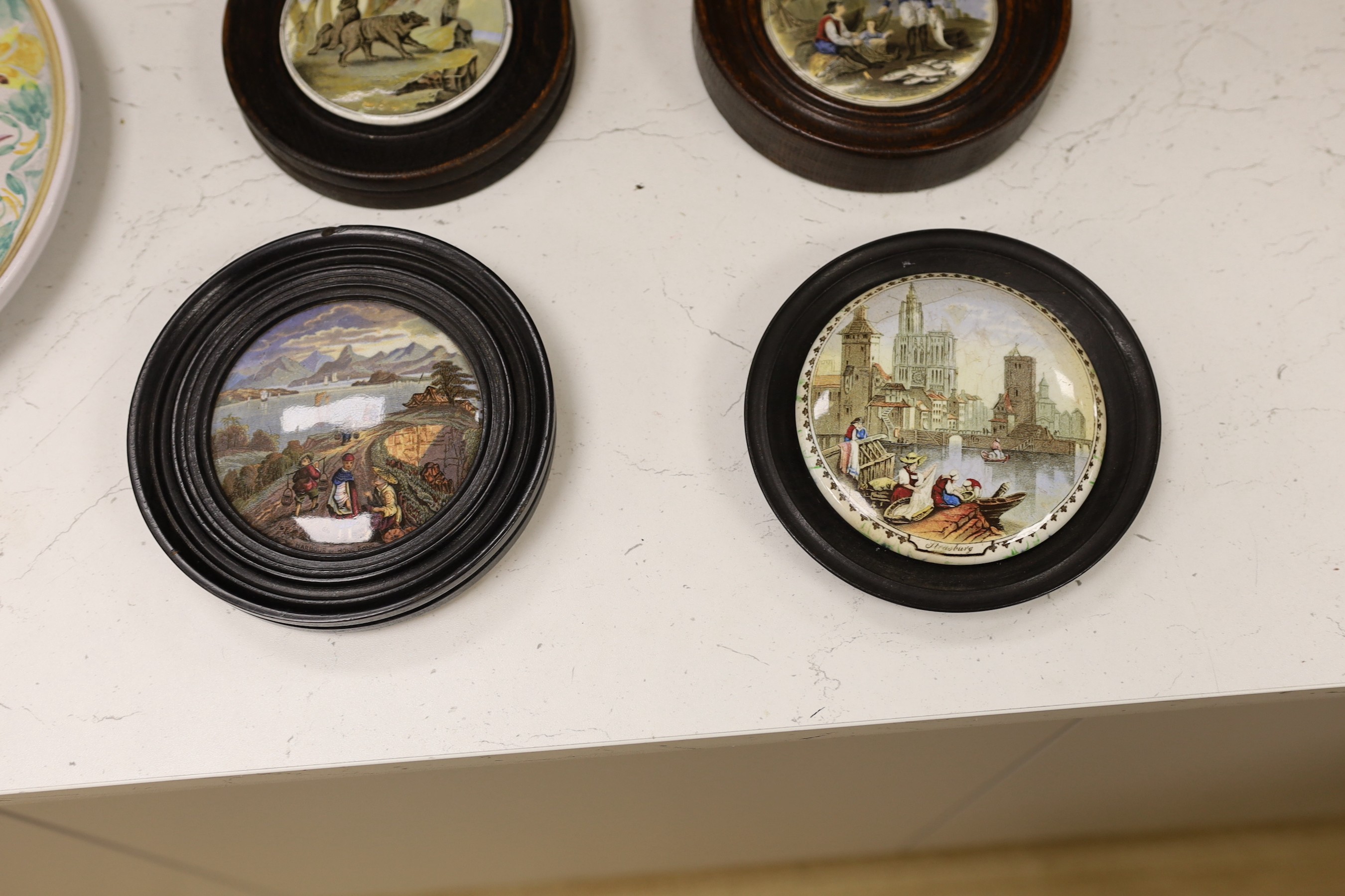 Ten 19th century framed ceramic pot lids